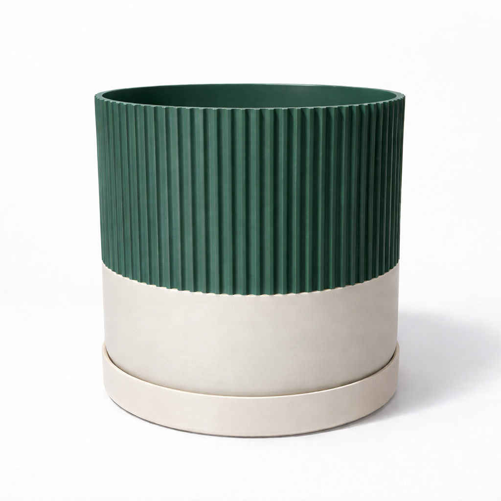 Green and beige ribbed planter on a white background