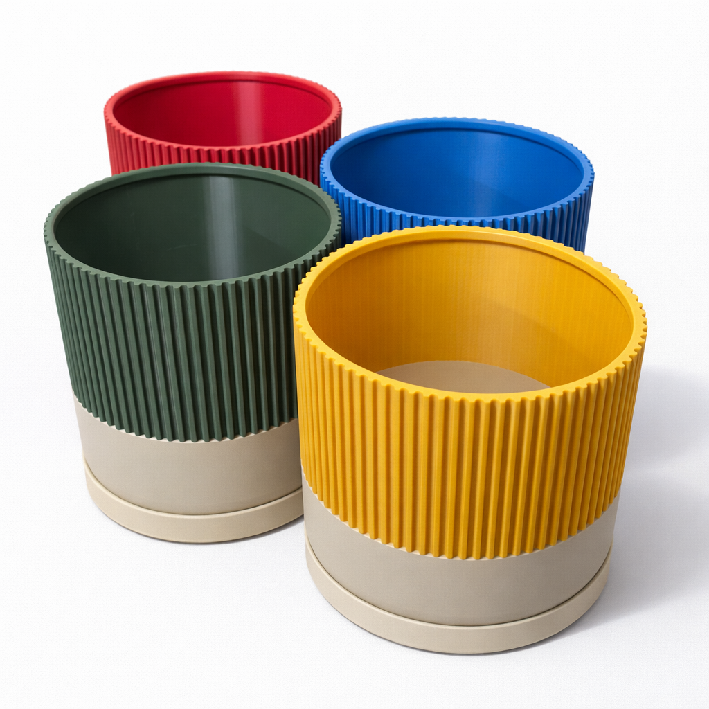 Four colorful planters in red, blue, green, and yellow on a white background