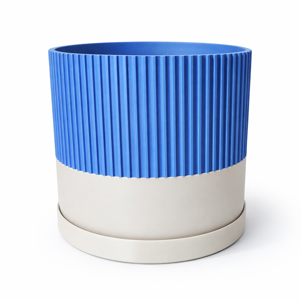Blue and beige ribbed planter on a white background